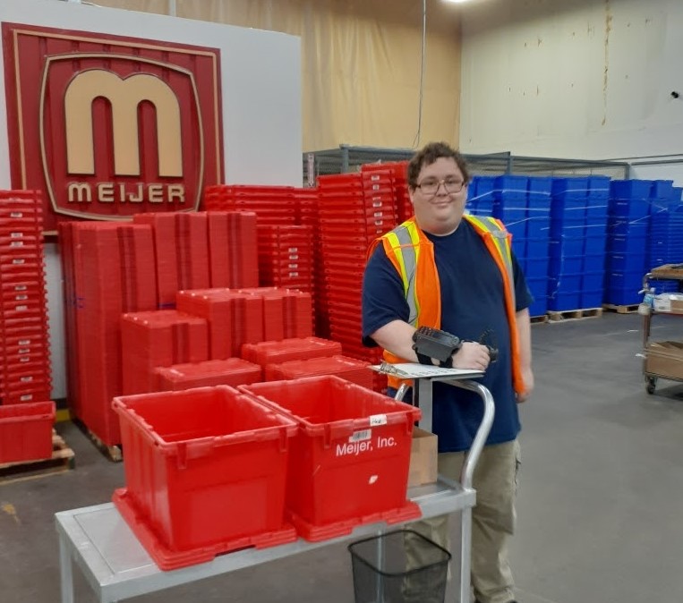 Young man working at Meijer